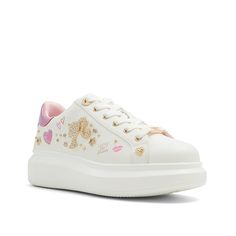 Aldo-Barbie Spec Sneaker Bring out your inner diva with the Aldo Barbie Spec sneaker. Glitering rhinestones and charms highlight this court-inspired pair that highlights casual ensembles with shining ease. Bridal Wedding Shoes, Americana Fashion, Adidas Fashion, Trending Sneakers, Safety Shoes, Platform Sneakers, Casual Boots, Sneakers White, Loafer Shoes