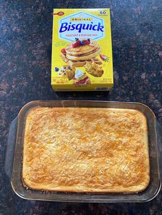 a box of biscuit next to a baking dish