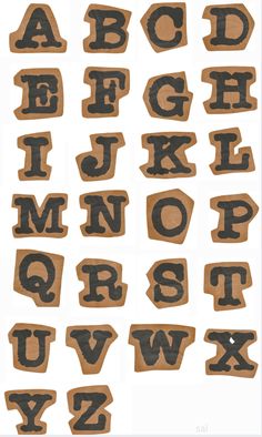 the letters are made out of brown paper