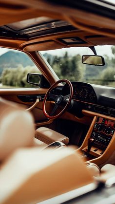 the interior of a car with wood trim