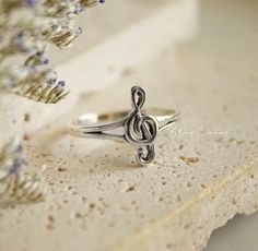 This cute treble clef ring is made from 925 sterling silver (hypoallergenic) and is the perfect gift for music lovers  Choose your size. Treble Clef Ring, Music Teacher Gift, Silver Gift Wrap, Music Teacher Gifts, Garnet And Gold, Treble Clef, Gift For Music Lover, Music Teacher, Silver Gifts