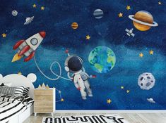 this is an image of a child's bedroom with space theme wallpapers