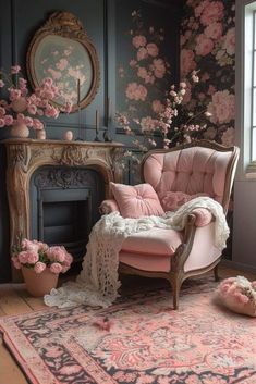 a pink chair sitting on top of a rug next to a fireplace