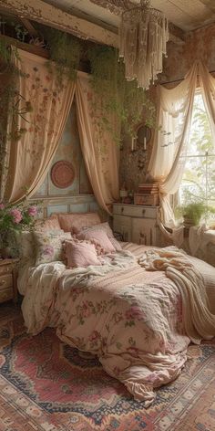 a bed sitting in a bedroom next to a window filled with curtains and flowers on top of it