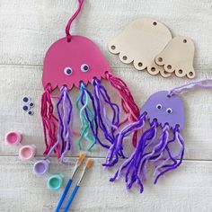 some crafting supplies are laid out on a table and ready to be made into an octopus or jellyfish