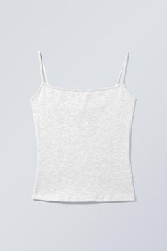 A slim fitted singlet made from a soft and stretchy cotton fabric. It has thin spaghetti shoulder straps, a squared neckline, and is slightly cropped. Weekday Clothing, Christmas Gift Ideas Clothes, Random Wishlist, 100% Cotton, H M Finds With Codes, Fitted Tops, Shop Clothes, White Fitted Cami Tank Top, Stockholm Outfits