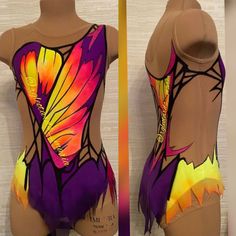 a woman's swimsuit with an artistic design on the front and back side