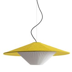 a yellow and white light hanging from a ceiling