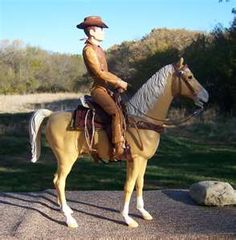 a statue of a man riding on the back of a horse