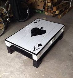 a coffee table made out of playing cards