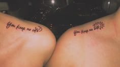 two women with tattoos on their backs saying you keep me safe