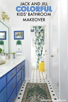 a bathroom with blue cabinets and white walls