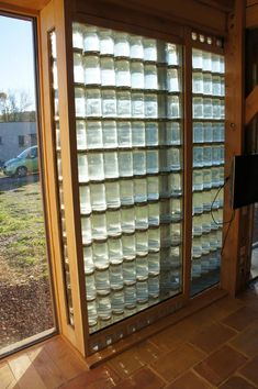 a room that has some glass jars in it