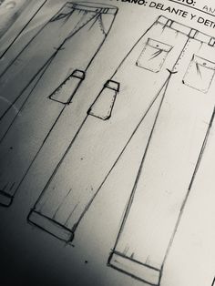 a drawing of a shirt and pants on a piece of paper