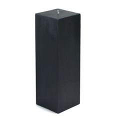 a tall black candle holder on a white background