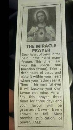 a paper with an image of jesus holding a cat in it's lap and the words, the miracle prayer