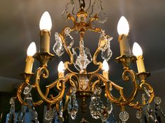 Hello lovers of antiques, amateurs and connoisseurs of original French antiques. If you want to see and buy an original French chandelier from the 1950s, you've come to the right place. If you are a connoisseur, one look and you know it's an original, but what about amateurs? Each of us knows that the original is better and has a high value that increases over the years. Today, you can try to learn from the example of this chandelier what to pay attention to when buying an original from that era French Chandelier, Crystal Pattern, Antique Chandelier, Electrical Installation, Copper Patina, Crystal Shapes, French House, Antique Glass, Hollywood Regency