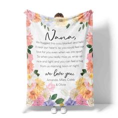 a blanket with flowers on it that says, namas