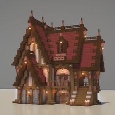 a very nice looking house made out of wood and brick with lights on the windows