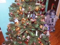 a star wars themed christmas tree with lights