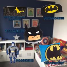 the batman pillow has been made to look like it is on display in this room