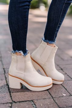 These Chelsea boots will have you feeling so bold and sassy! The thick tread is right on trend and we love that faux suede fabric! These booties are going to look amazing this fall and winter! True to size. White Boots Outfit Ankle Booties, Booties Shop, Church Outfit Winter, Chunky Heel Booties, Heeled Chelsea Boots, Booties Outfit, Dressy Shoes, Chic Heels, Grey Booties