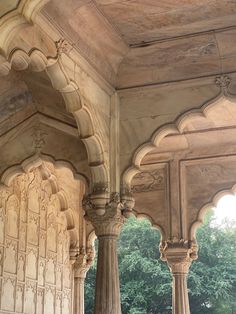 an ornate building with pillars and arches