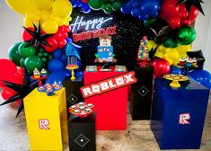 a birthday party with balloons and decorations