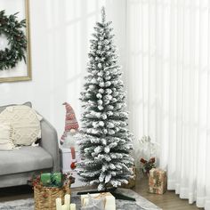 a white christmas tree in a living room