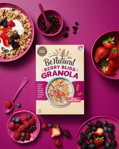 bowls of granola, berries and yogurt on a purple surface with spoons