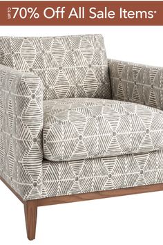 a gray and white chair with the words 70 % off all sale items