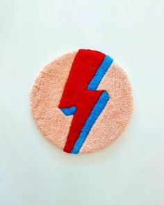 ✨ Add a touch of Bowie-inspired flair to your space with this vibrant tufted wall hanging. Featuring a stunning ray design in bold red, blue, and pink hues, this unique piece pays homage to the iconic legend. Elevate your decor with a burst of color and artistic expression. Perfect for music enthusiasts and lovers of eclectic style. Shop now and bring the spirit of Bowie into your home! 🌟 Tufted Wall Art features a rich texture that adds depth and character to your walls. Each piece is lovingly Tufted Wall Hanging, Tufted Wall Art, Tufted Wall, Ziggy Stardust, Artistic Expression, Eclectic Style, Rich Textures, Tufted Rug, Stardust