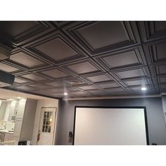 These elegant stylish 3D PVC ceiling tile designs are excellent matter for remodeling or new construction to a ceiling or wall decoration. These wall panels are easily laid into a standard 15/16 T-bar drop ceiling grid system or glued over any flat substrates. Please note: The sample size is 6x6 inches, and it is a reduced version of the ceramic tile. Art3d Color: Black | Art3d 2 Ft. X 2 Ft. Glue-Up or Drop-in PVC Ceiling Tile 0.04 H x 24.0 W x 24.0 D in PVC, Ceramic in Black | 23.6" L X 23.6" W Black Ceiling And Trim, 3d Ceiling Panel, Cover Drop Ceiling, Ceiling Tile Ideas, Peel And Stick Ceiling Tiles, Drop Ceiling Alternatives Basement, Black Coffered Ceiling, Basement Ceiling Tiles, Gothic Home Ideas