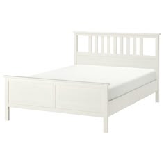 a white bed frame with two drawers on each side and one drawer at the end