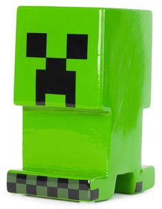 a green minecraft creeper with black eyes and no head is shown in front of a white background