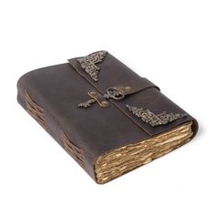 an old leather book with ornate cross decorations