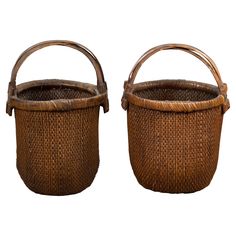 two woven baskets sitting next to each other