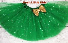 a green and gold tutu skirt with stars on it