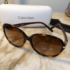 Excellent Condition In Case. Plastic Frame Brown Gradient Lens Non-Polarized Uv Protection Coating Coating Lens Width: 58 Millimeters Bridge: 15 Millimeters Arm: 140 Millimeters Havana Formal Brown Sunglasses, Calvin Klien, Aviator Eyeglasses, Black Aviator Sunglasses, Red Sunglasses, Tortoise Shell Sunglasses, Black Aviators, Brown Sunglasses, Calvin Klein Collection