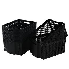 two black plastic baskets sitting next to each other