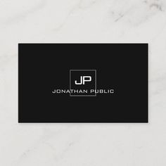 a black and white business card with the logo for jonathan public, an electronic company