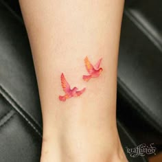 two pink birds on the ankle