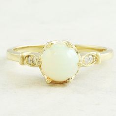 7x7mm Natural Opal & Diamonds 14k Solid Yellow Gold Ring Ring Size 7us (Free Resizing Upon Request) Ring Material: 14k Solid Gold Approximate Weight: 2.2 Grams Gemstone: Natural Opal Gemstone Shape: Round Cabochon Gemstone Approxiamte Dimensions: 7.00x7.00 Mm Gemstone Quantity: 1 Diamonds: Natural Round Shaped Diamonds Quantity: 4 Ring Quantity: One Ring Condition: New Made In The Usa Delivered In An Elegant Gift Box Please Contact Us When You Are Placing Your Order To Request The Ring Size Classic Yellow Gold Opal Ring, Yellow 14k Gold Diamond Ring, 14k Gold Yellow Diamond Ring, Yellow Diamond Ring In 14k Gold, Classic Gold Opal Gemstone Ring, Classic Opal Birthstone Ring With Round Band, Timeless Gold Opal Ring For Anniversary, 14k Yellow Gold Opal Ring Birthstone, Classic Opal Birthstone Ring