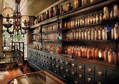 an old fashioned pharmacy cabinet filled with lots of medicine bottles