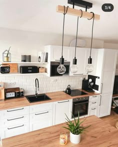 the kitchen is clean and ready for us to use in its new owner's home