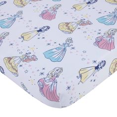 a white sheet with princesses on it