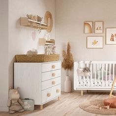 a baby's room is decorated in neutral colors