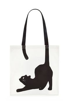 a black cat silhouette on a white tote bag