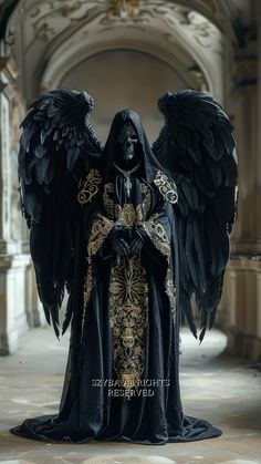 a statue of an angel with black wings