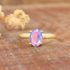 Lavender opal ring for women, Minimalist ring, fire opal jewelry, Statement ring, AAA Ethiopian opal ring, Natural fire opal jewelry, 925 Sterling silver ring, Gold Filled ring, Gift for her. *Other Similar Jewelry Available Here* https://www.etsy.com/shop/AreebaJewelry Details:- Gemstone - Ethiopian opal  Stone Color - Natural  Stone Setting - Prong Quality - AAA Grade Rize Size - 4 US TO 9 US Available Type - 100% Natural  Shipping service - Free worldwide shipping service About AreebaJewelry: Anniversary Solitaire Opal Ring, Iridescent Opal Promise Ring, Opal Crystal Open Ring As Gift, Opal Crystal Open Ring For Gift, Opal Open Ring Crystal Ring For Gift, Solitaire Opal Ring In Round Shape, Round Solitaire Opal Ring, Ethiopian Opal Birthstone Promise Ring, Solitaire Opal Ring With Round Shape